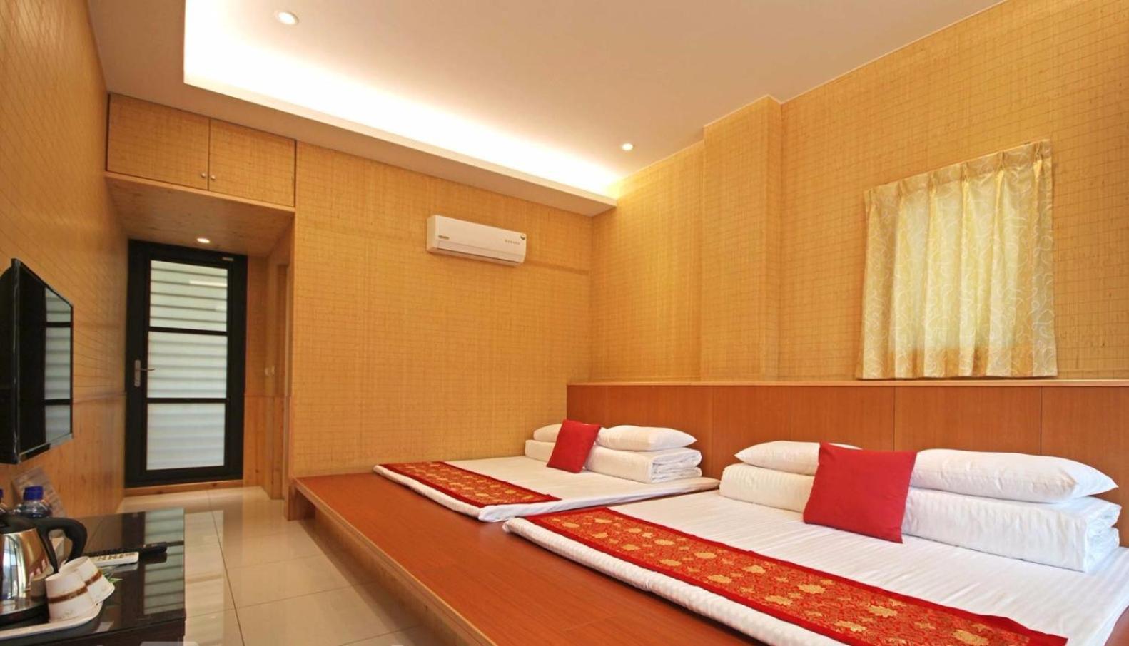 לוגו Qian'S Garden Inn מראה חיצוני תמונה