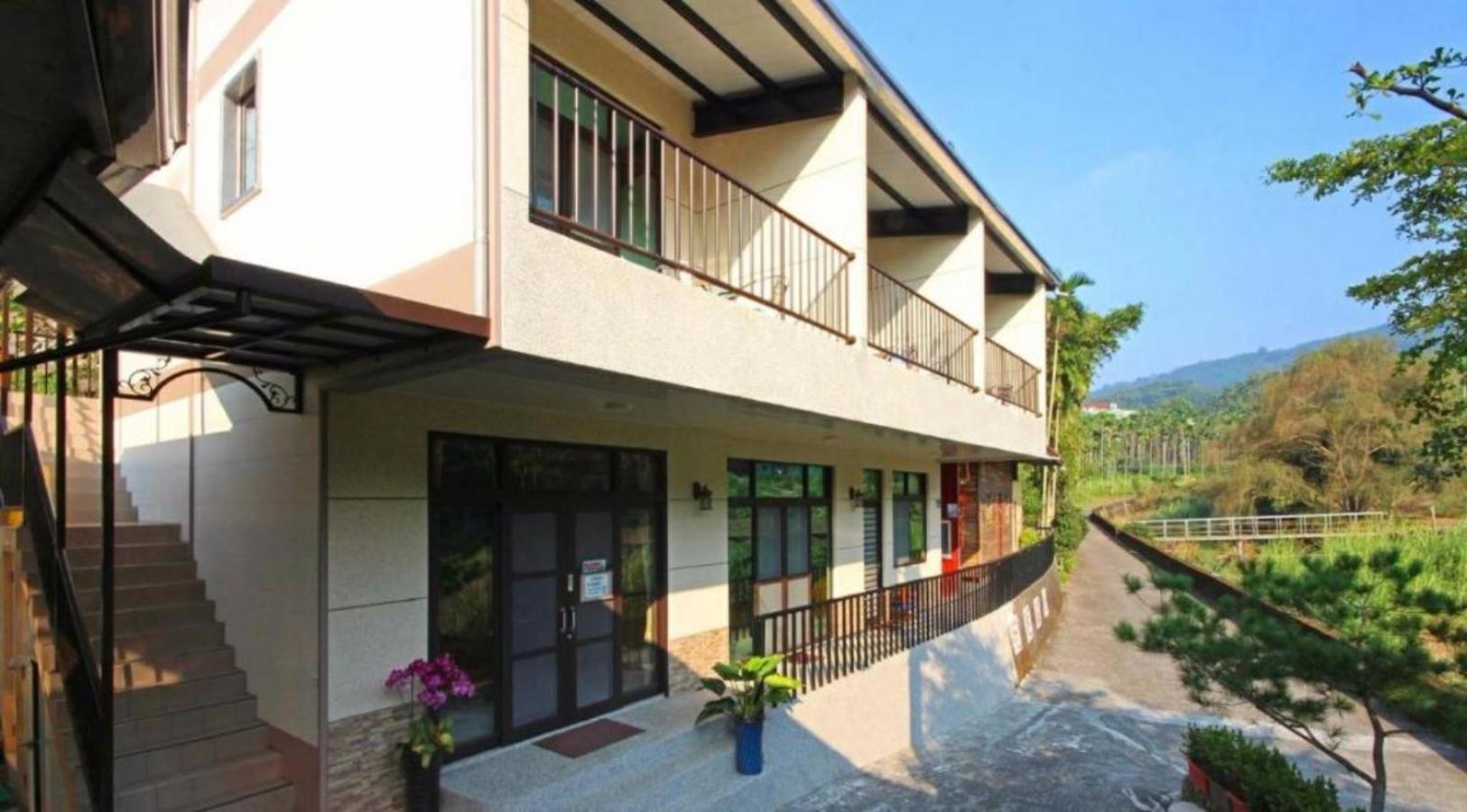 לוגו Qian'S Garden Inn מראה חיצוני תמונה